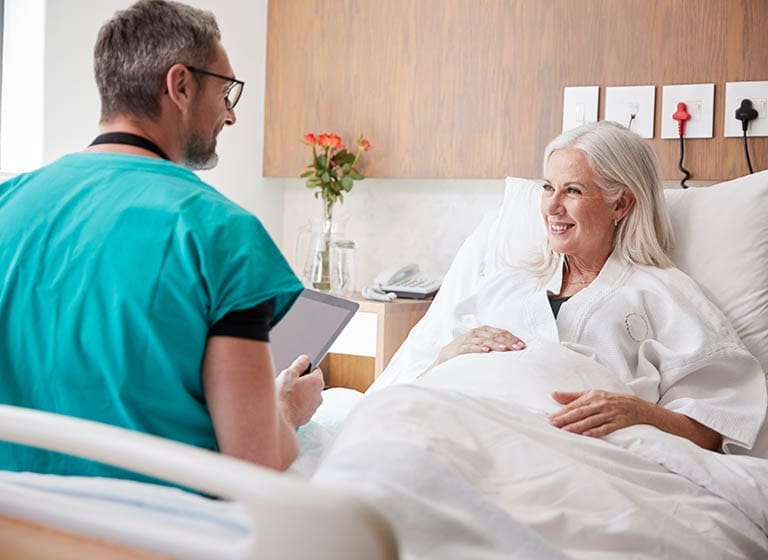 Healthcare professionals collaborating to improve patient experience